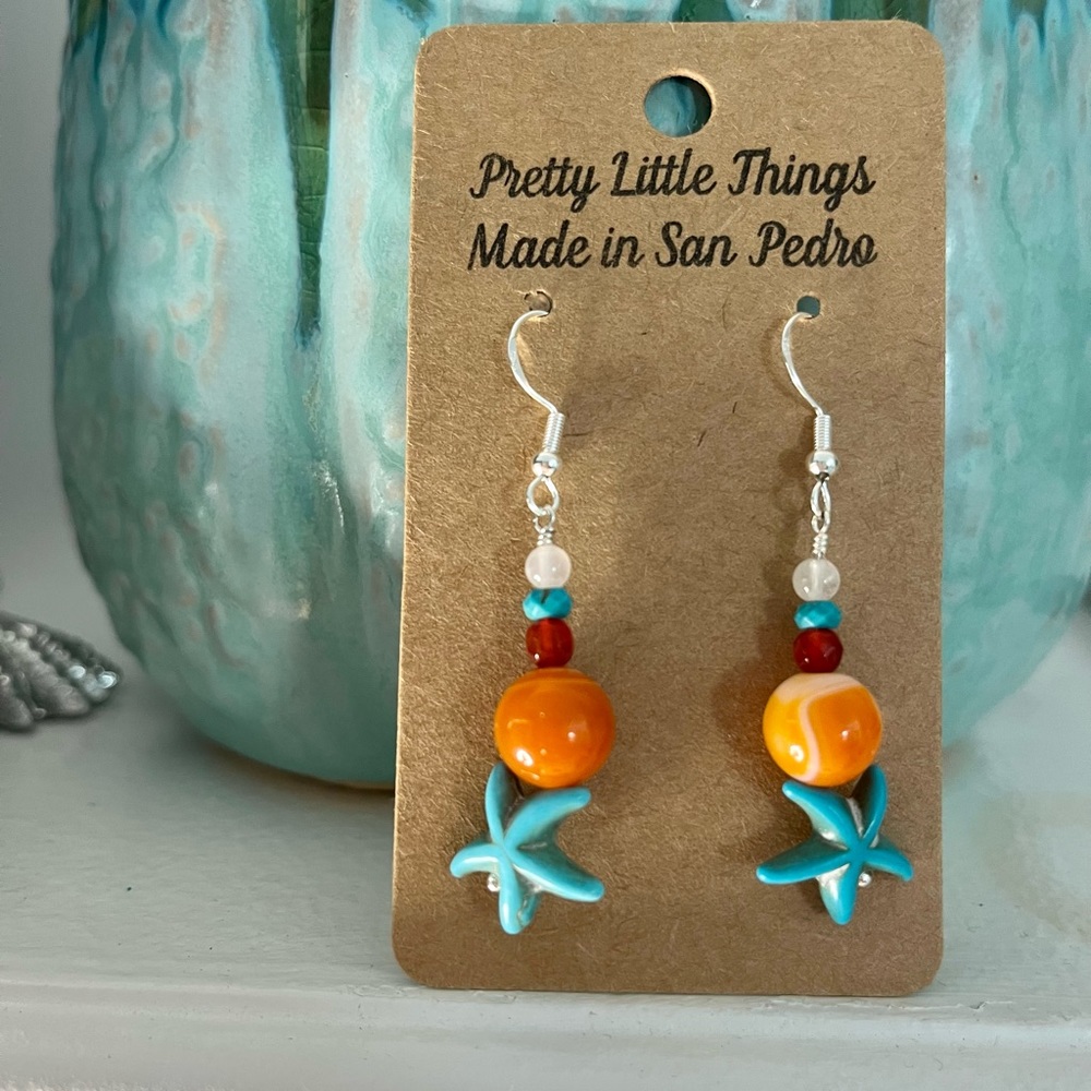 Handmade ocean inspired sterling silver earrings.